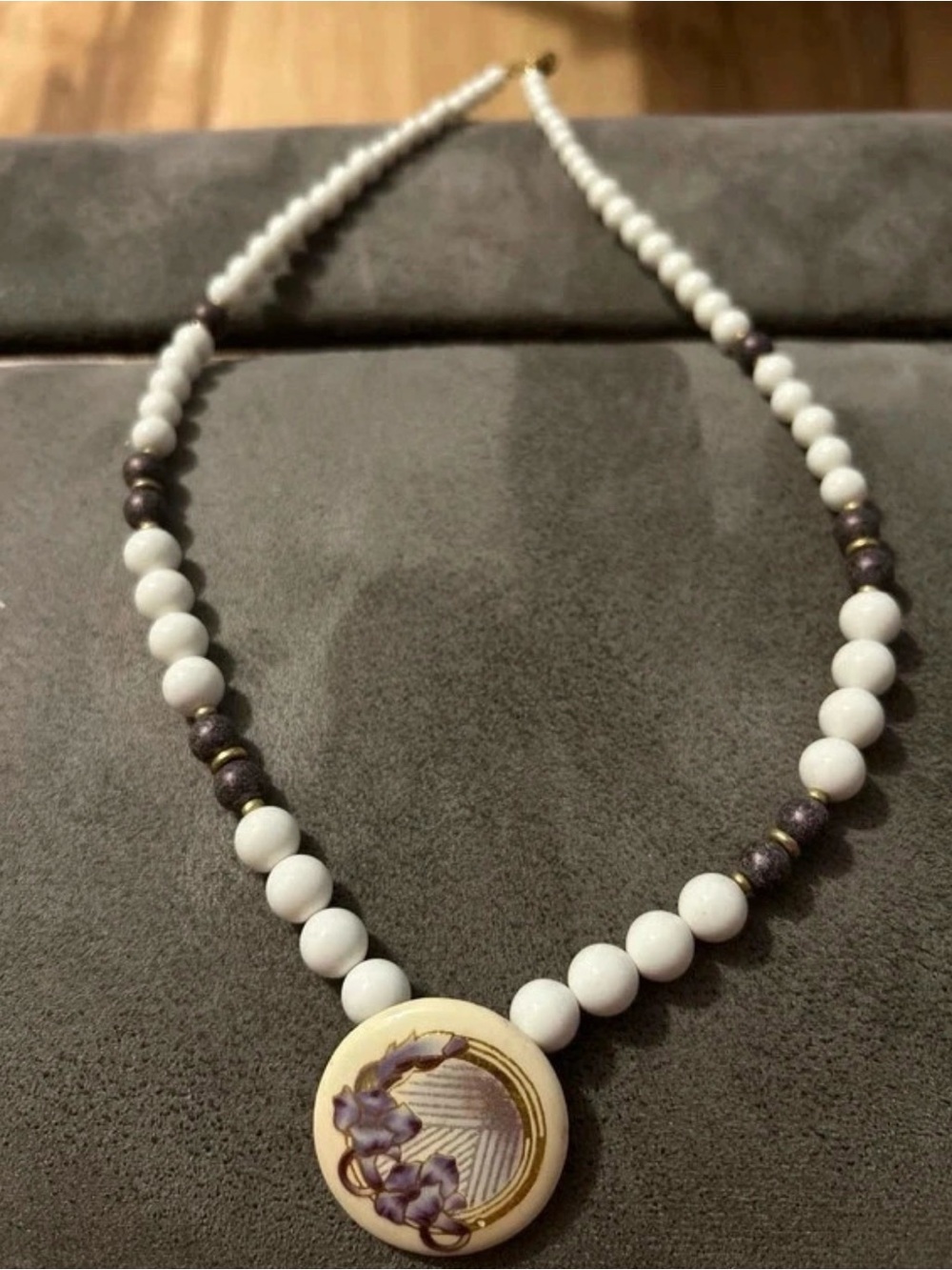 White Bead Necklace with Purple Floral Pendant